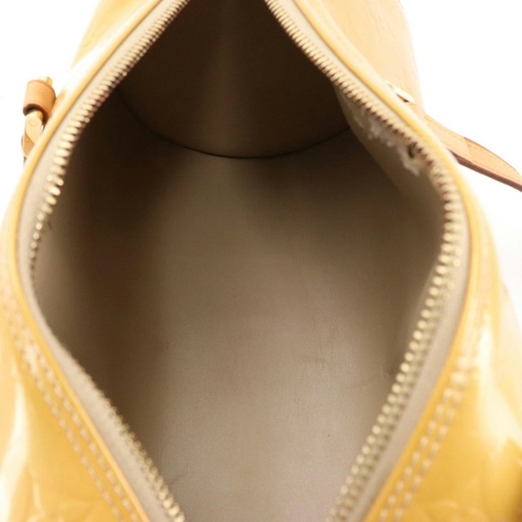 Louis Vuitton Bedford Papillon
Handbag in Monogram Mango Vernis - Picture 5 of 10